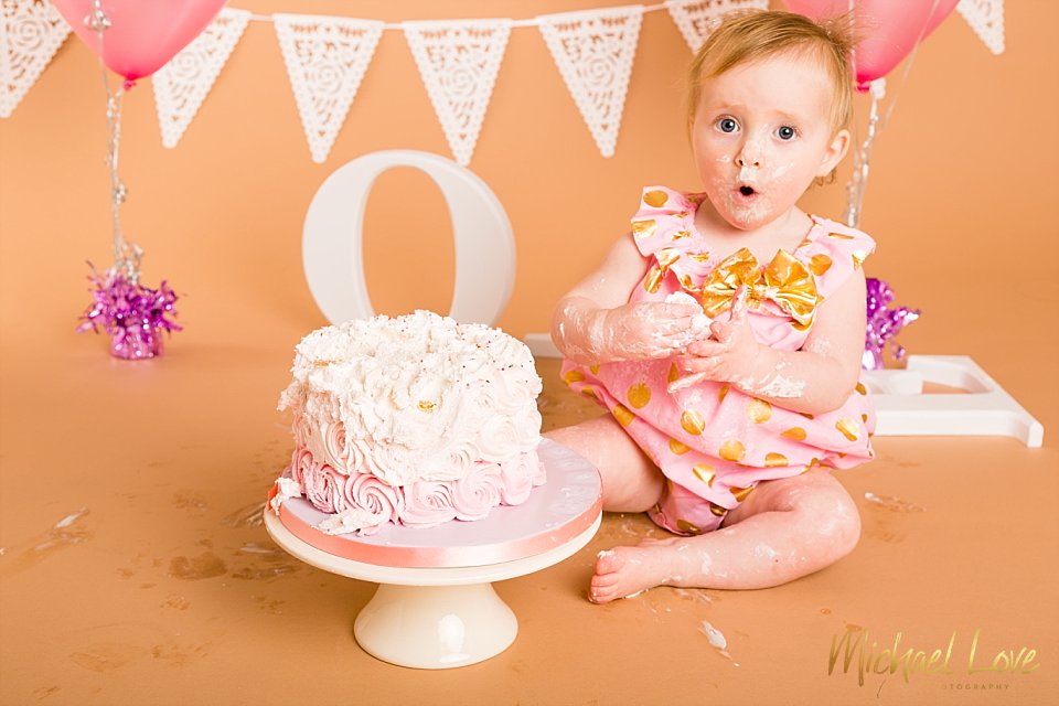 Cake smash studio photo shoot with a baby girl